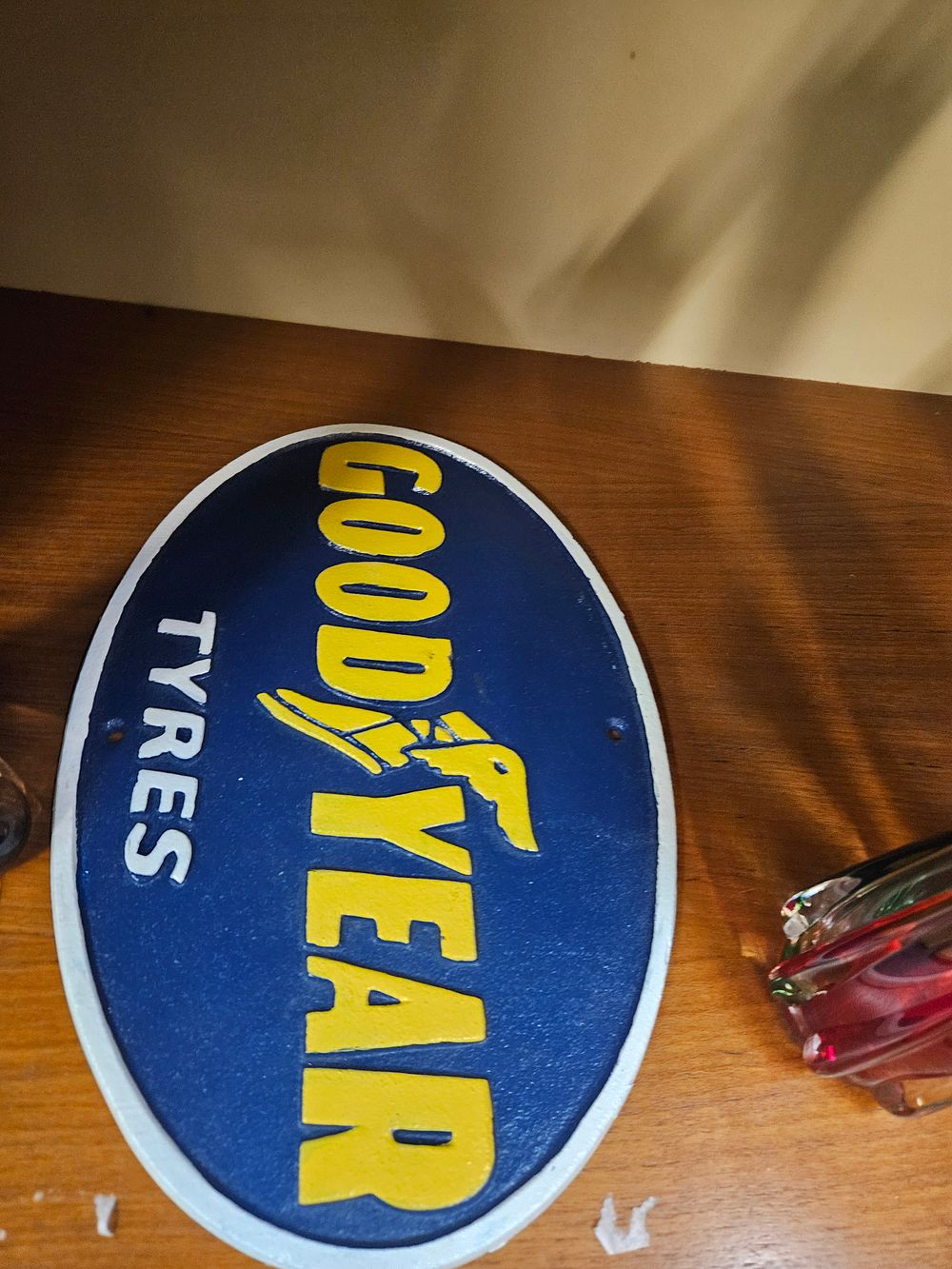 Lot 221 – A Cast Metal Goodyear Tyres Oval Advertising Sign