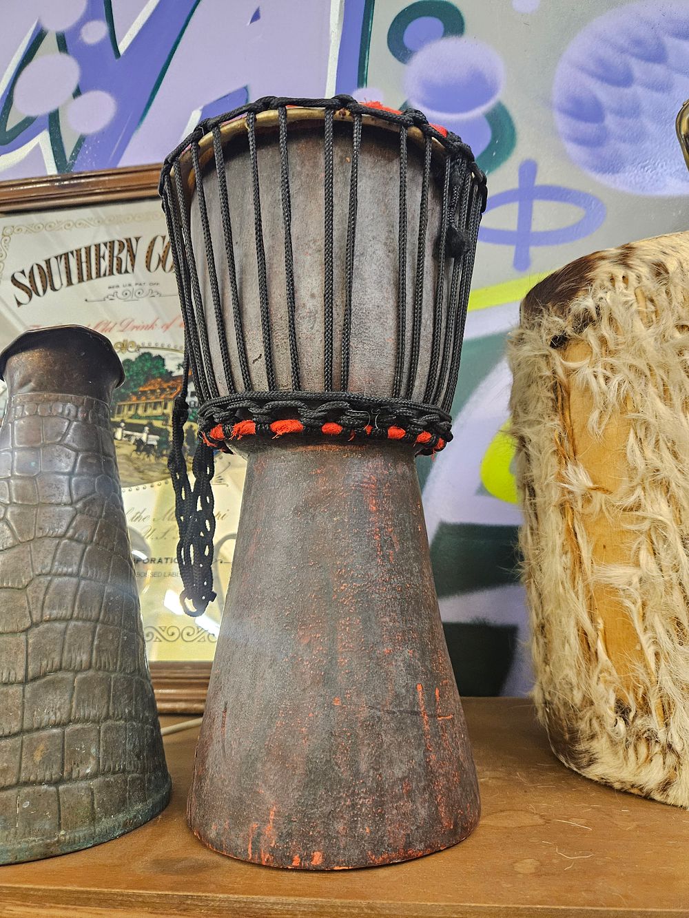 Lot 224 – A Trio of Ethnic Style Decorative Objects Including a Carved Wood Djembe Drum