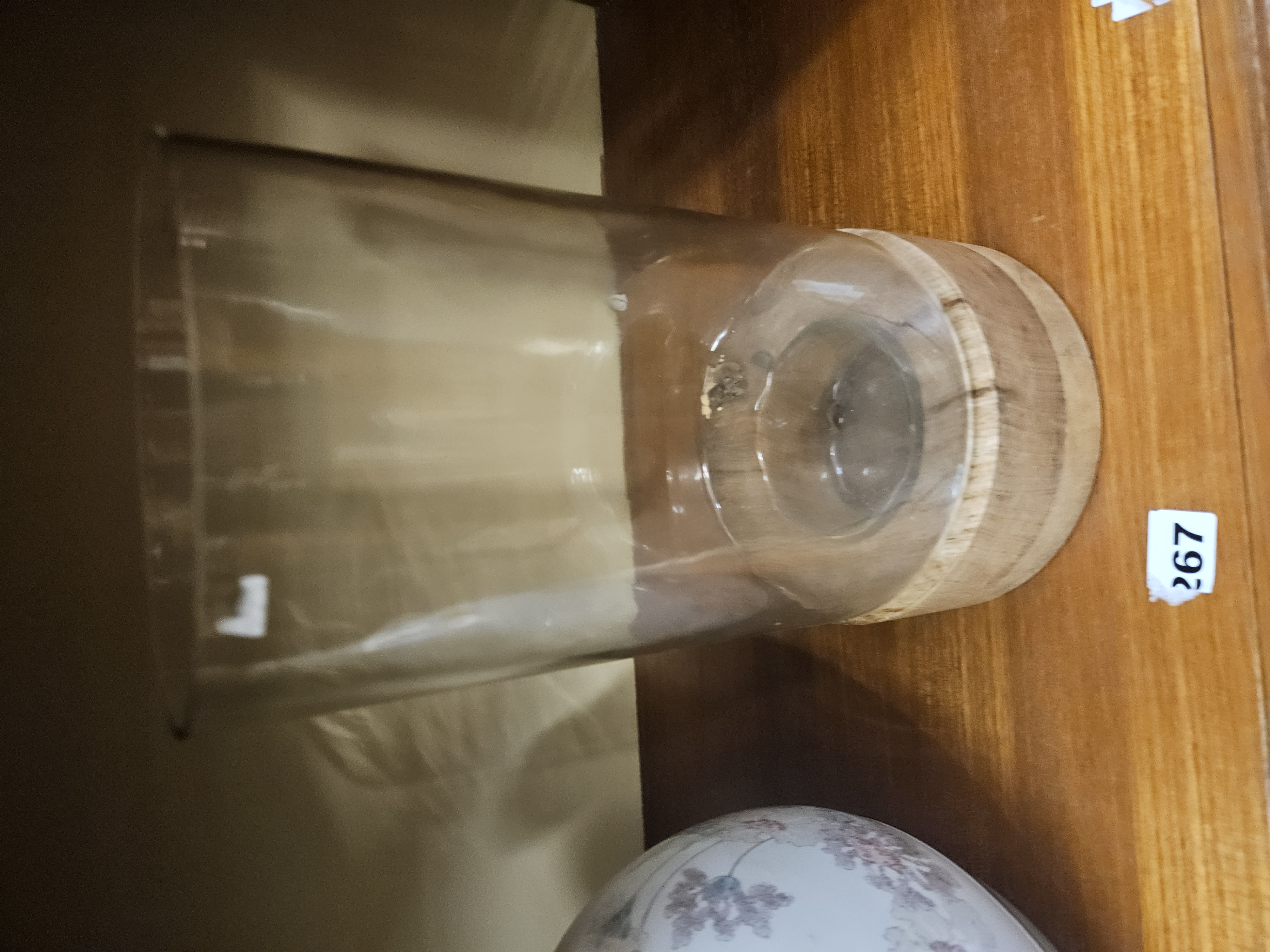 A Glass and Wood Hurricane Candle Holder