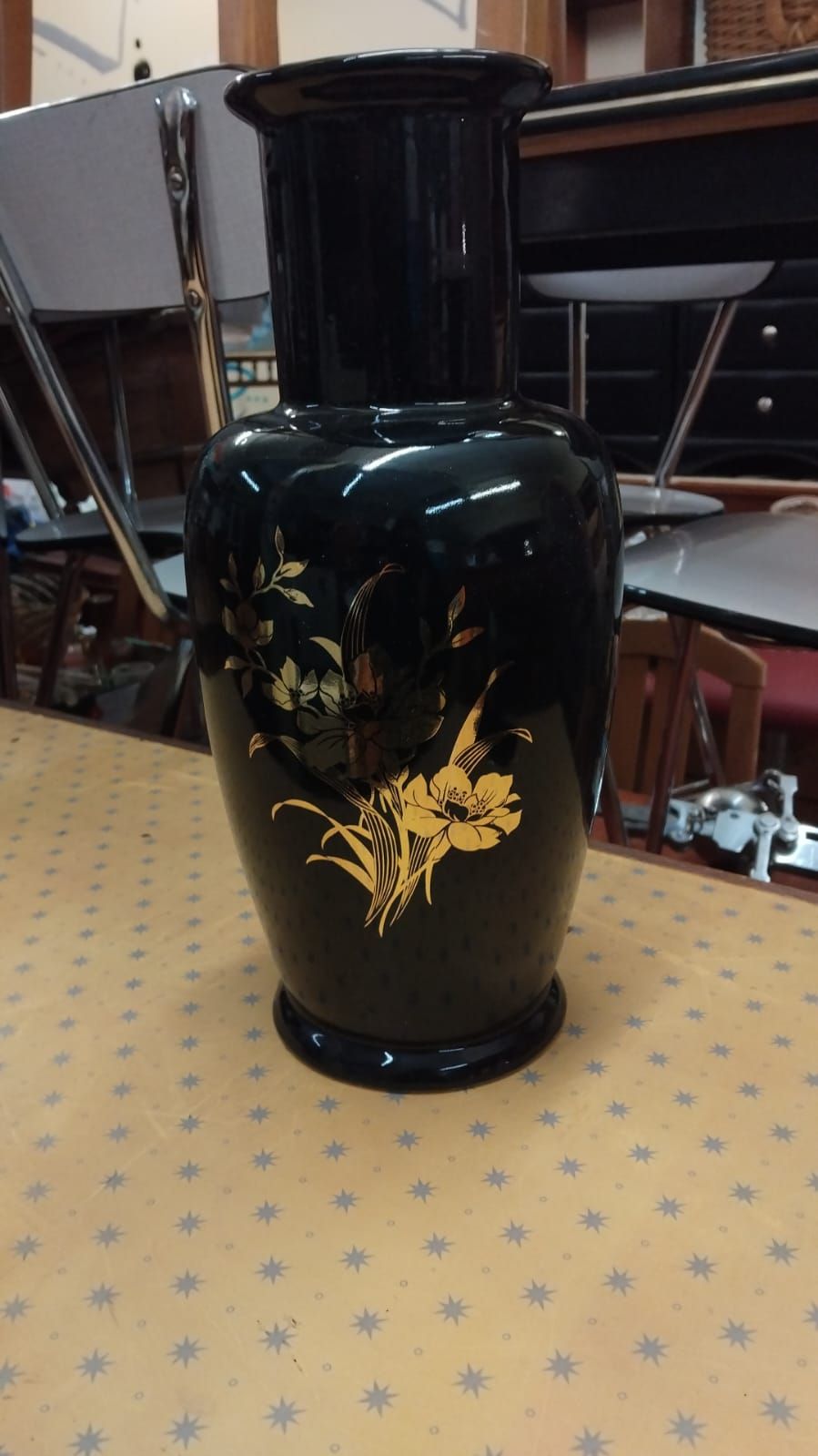 Lot 252 – A Vintage Mid-20th Century Black Glazed Ceramic Vase with Gilt Floral Motif