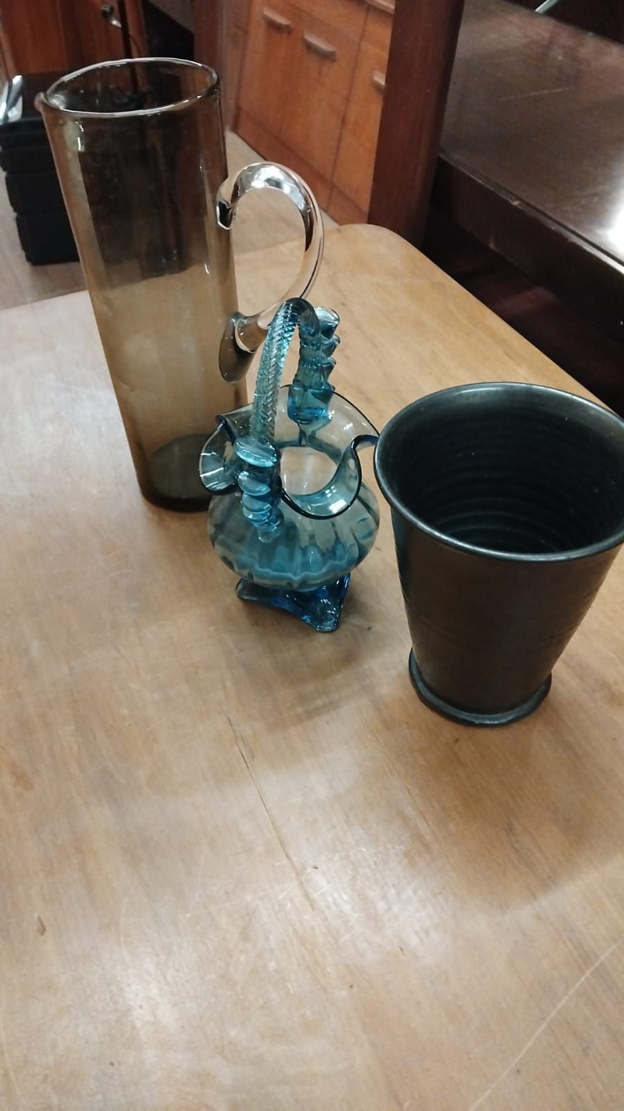 Lot 258 – A Trio of Mid-Century Decorative Glassware Including a Smoke-Grey Pitcher and Blue Glass Basket