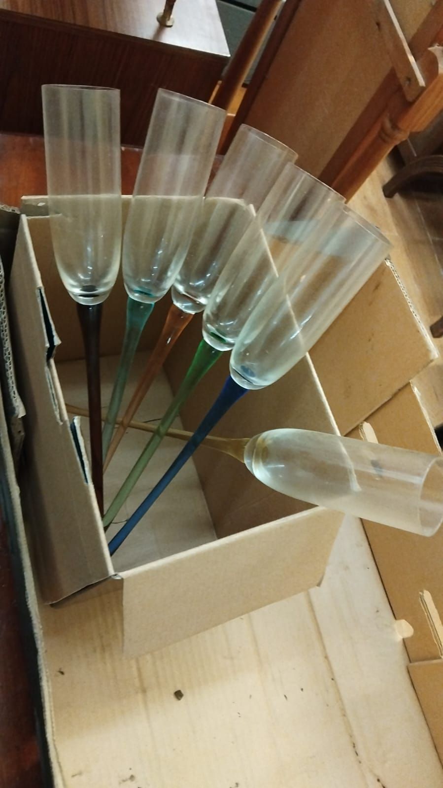 Lot 259 – A Set of Six Footless Hand-Blown Coloured Glass Champagne Flutes in the Style of Artland