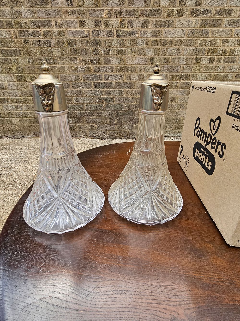 Lot 263 – A Pair of Late 19th or Early 20th-Century Silver-Plated and Cut Glass Claret Jugs
