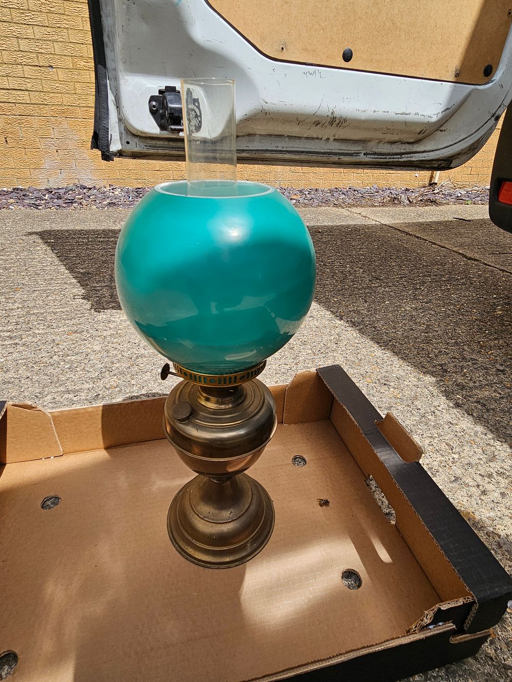 Lot 270 – Late 19th or Early 20th Century Brass Oil Lamp with Teal-Green Opal Glass Shade
