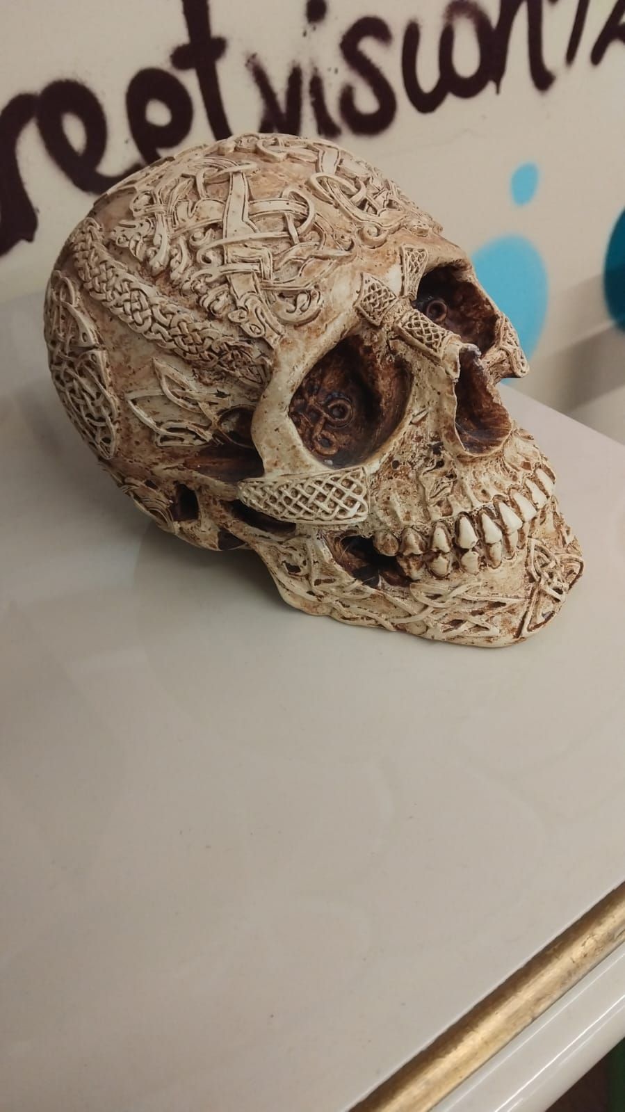 Lot 287 – A Contemporary Celtic-Style Cast Resin Decorative Skull