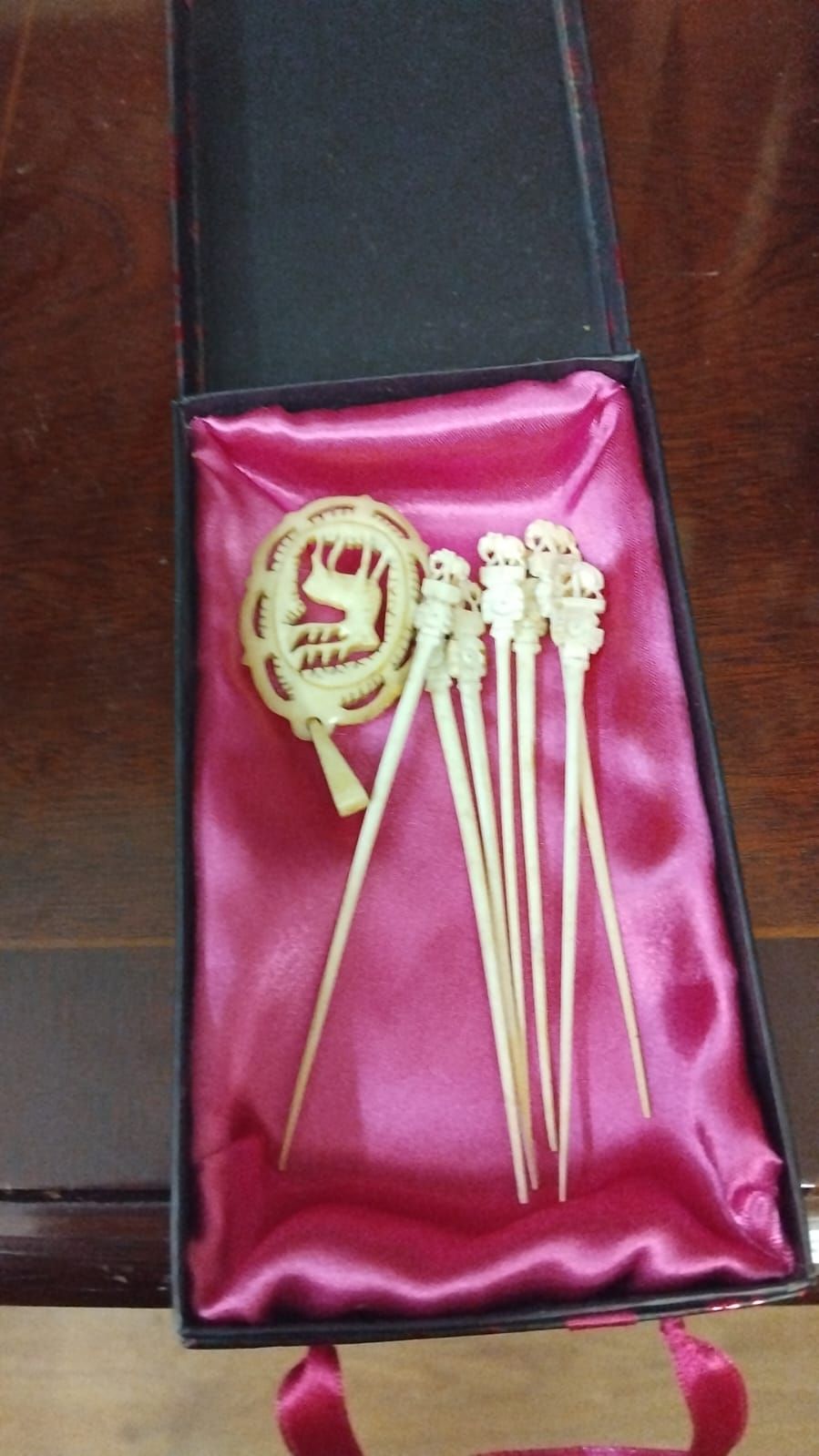 Lot 319 – A Collection of Carved Bone Animal-Themed Cocktail Picks and an Openwork Brooch