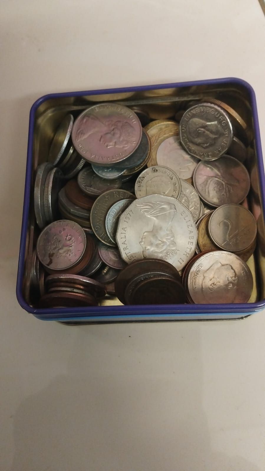 Lot 323 – A Collection of International Coins, including AU, UK, LU, and AT Specimens