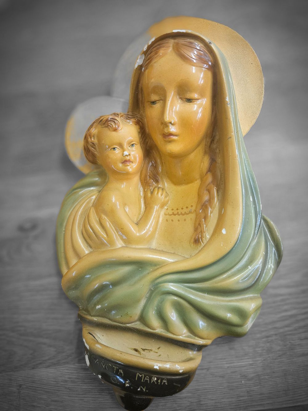 Lot 166 – A Mid-20th Century Painted Chalkware Wall Plaque of the Madonna and Child