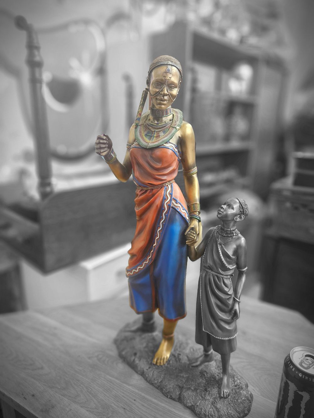 Lot 170 – A large polychrome decorative figure of a Maasai woman and child