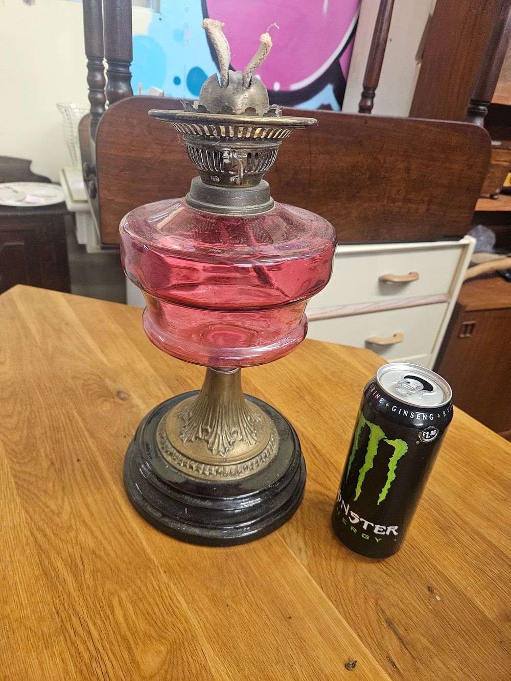 Lot 174 – Victorian Cranberry Glass Duplex Oil Lamp on Ebonised Base