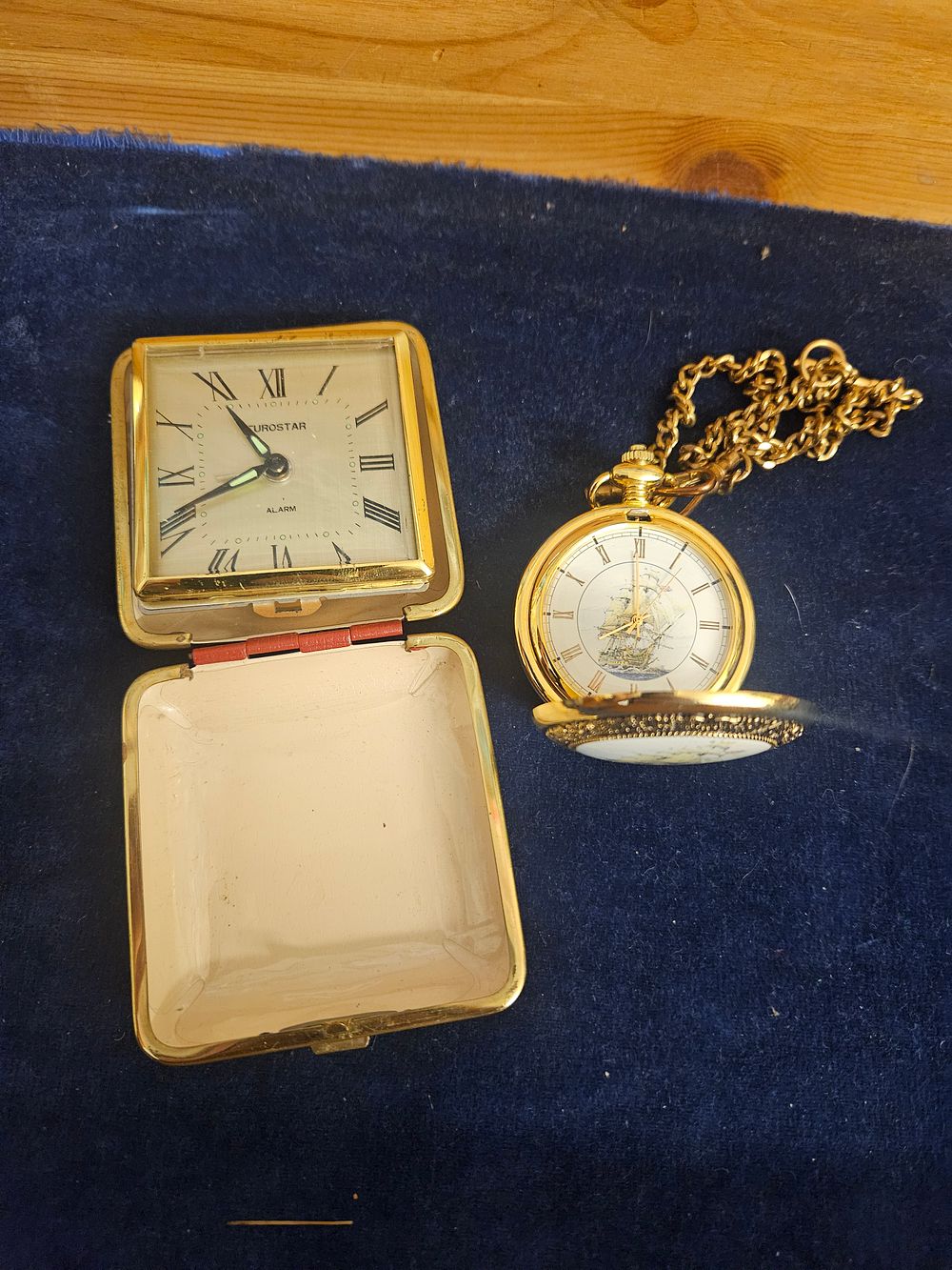 Lot 217 – Two Gold-tone Timepieces comprising a Hunter-cased Pocket Watch and a Eurostar Travel Alarm Clock