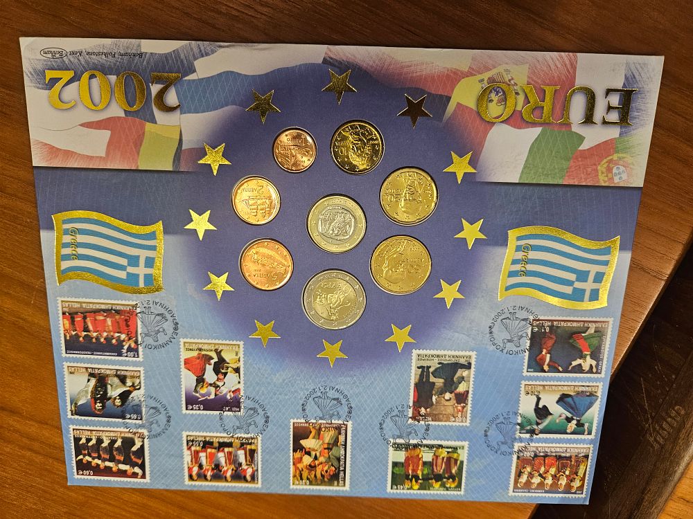 Lot 238 – GR 2002 Euro Coin and Stamp Set, Mixed Metals