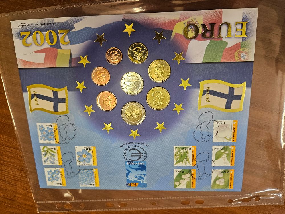 Lot 241 – FI 2002 Euro Coin and Stamp Set, Various Metals
