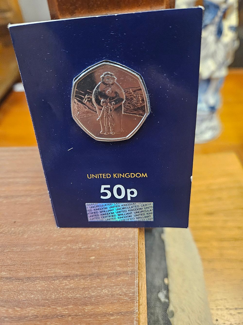 Lot 249 – 2017 UK Peter Rabbit Brilliant Uncirculated 50p Coin in Change Checker Card