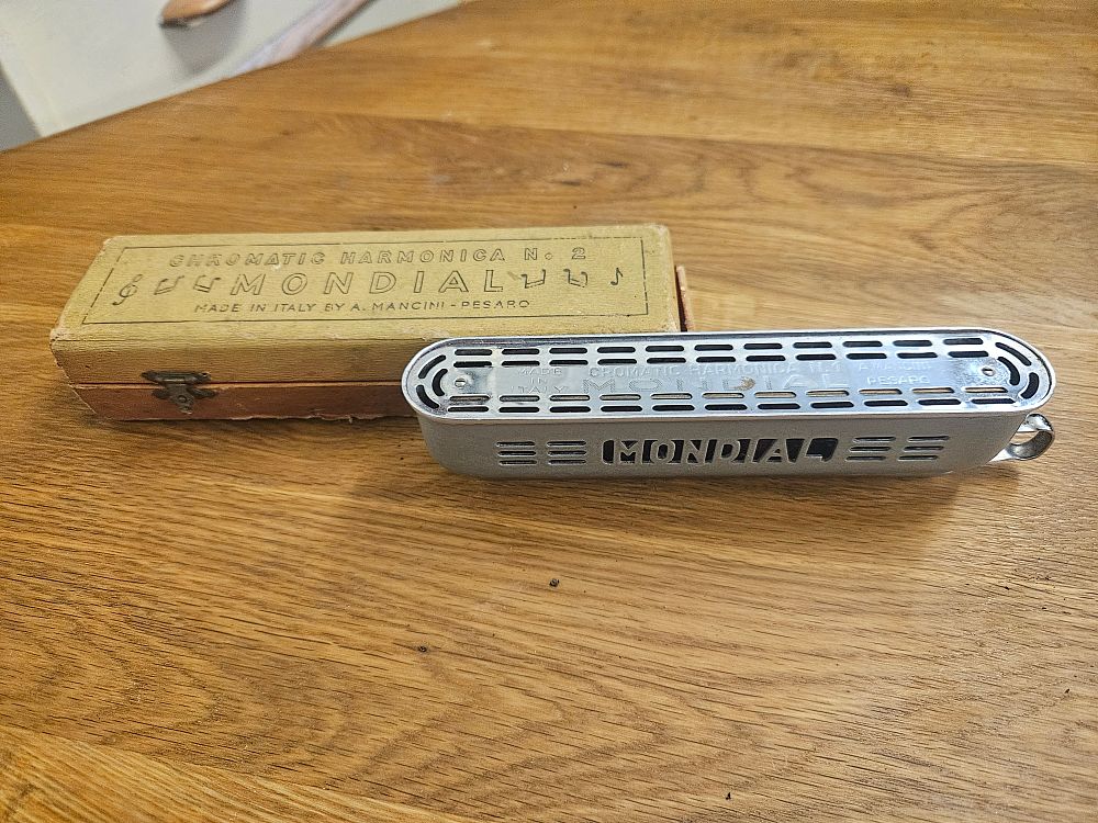Lot 288 – Italian Mondial No. 1 Chromatic Harmonica by A. Mancini