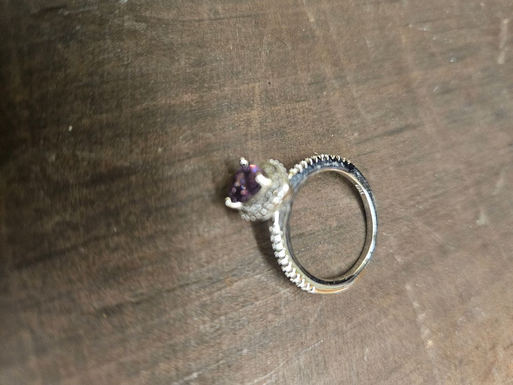 Lot 306 – 925 Silver Heart-Cut Purple Stone Halo Ring