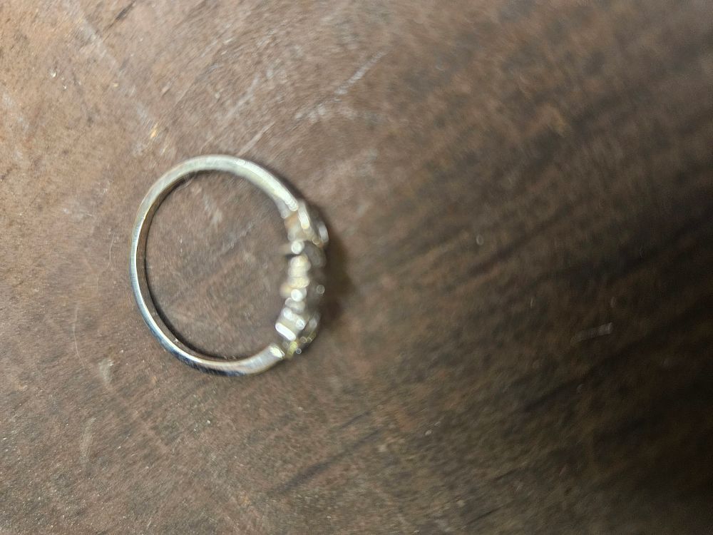 Lot 310 – A five-stone 925 silver ring