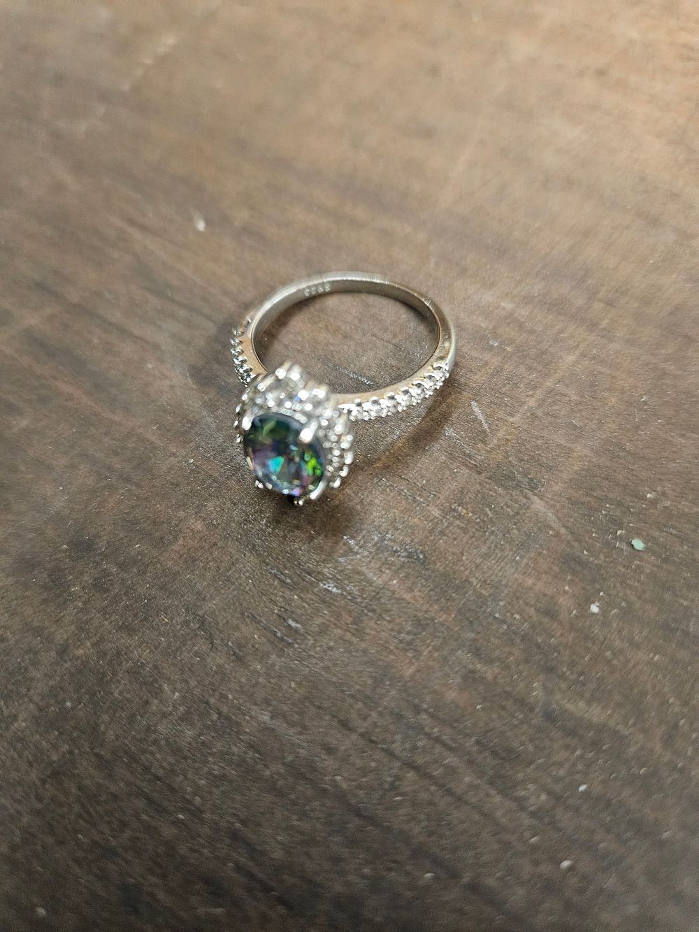 Lot 316 – A 925 Silver Mystic Topaz Style Halo Ring