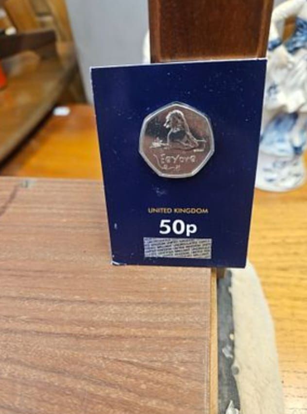 Lot 201 – 2022 UK Winnie the Pooh Series Eeyore 50p Brilliant Uncirculated Coin