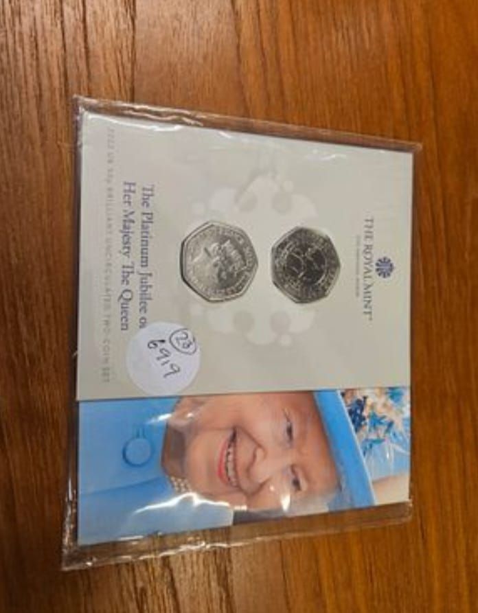 Lot 213 – A Pair of 2022 UK Platinum Jubilee 50p Brilliant Uncirculated Coins