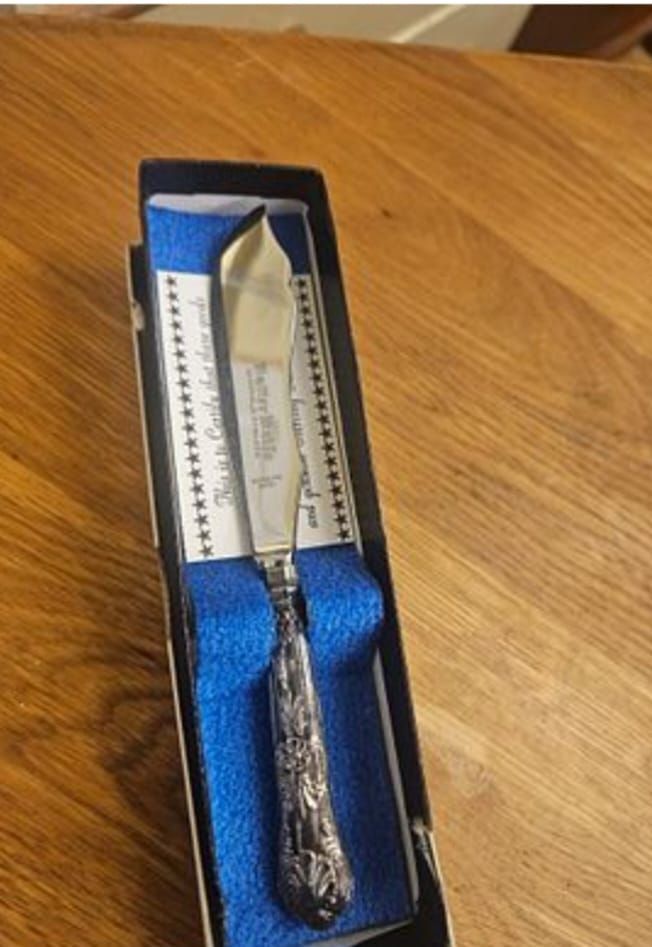 Lot 228 – Silver master butter knife in original presentation box