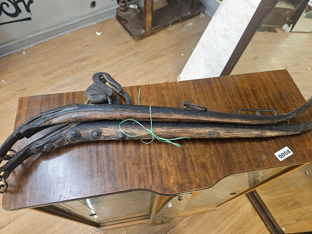 Lot 162 – A Pair of Antique Hardwood and Iron Horse Hames
