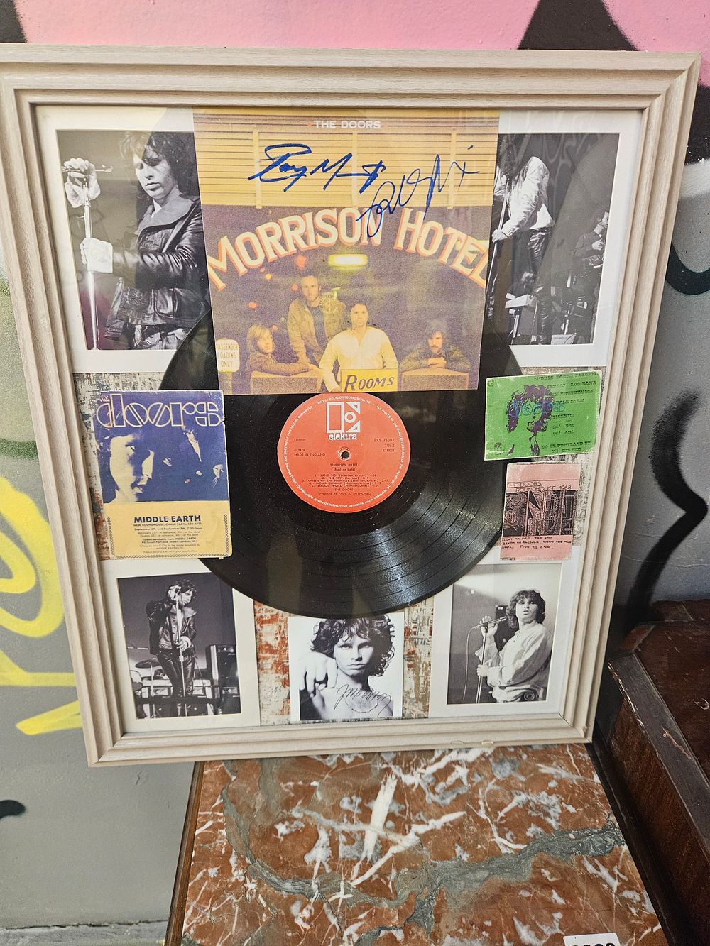 Lot 164 – A Framed Collection of The Doors Memorabilia Featuring Signed Morrison Hotel Album Segment and Vinyl Record