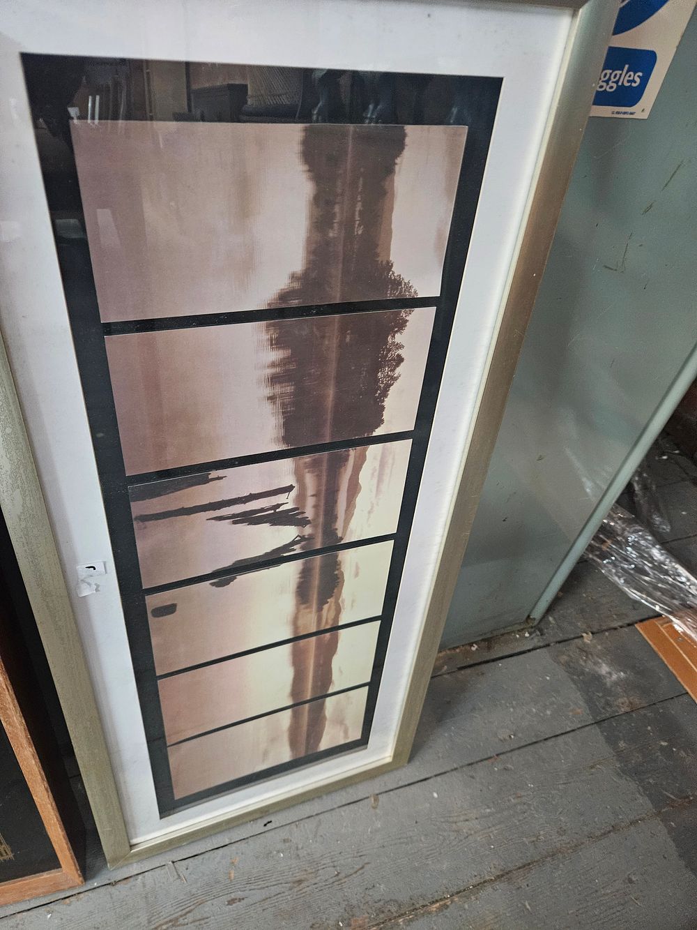 Lot 193 – A contemporary multi-panel panoramic sepia-toned photographic print depicting a lake landscape