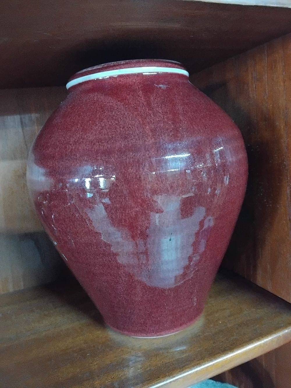 Lot 214 – A 20th Century Oxblood Glazed Ceramic Vase in the Chinese Style