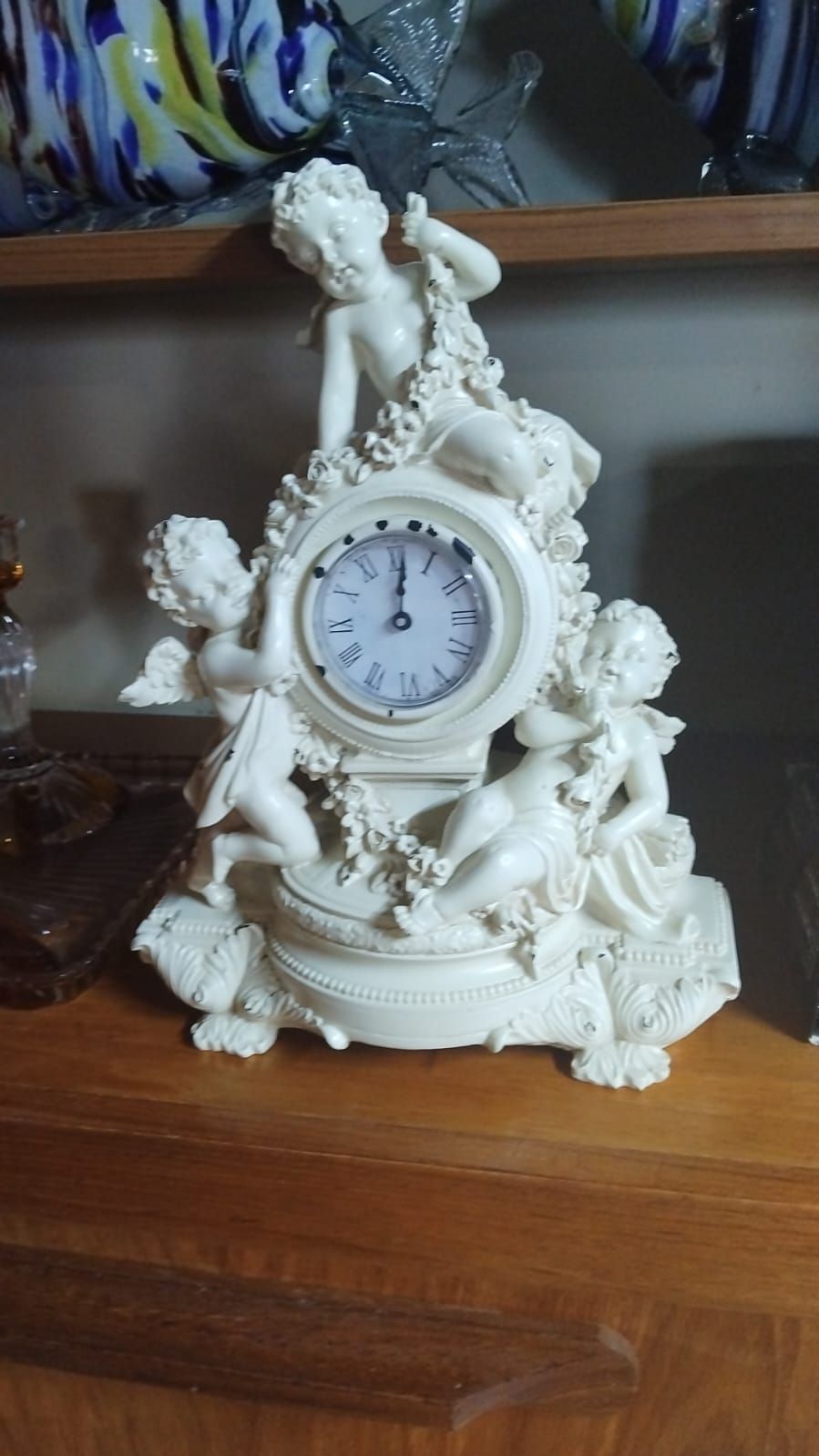 Lot 282 – A 20th Century Rococo Style Moulded Composite Mantel Clock with Cherubs