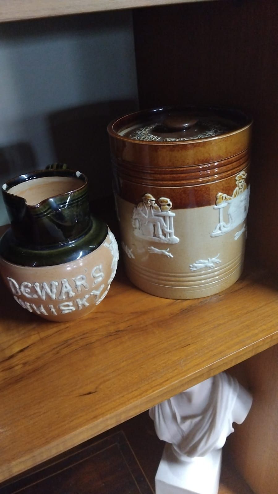 Lot 288 – Two salt-glazed stoneware items including a Dewar’s Whisky advertising jug and a lidded jar attributed to Royal Doulton Lambeth af
