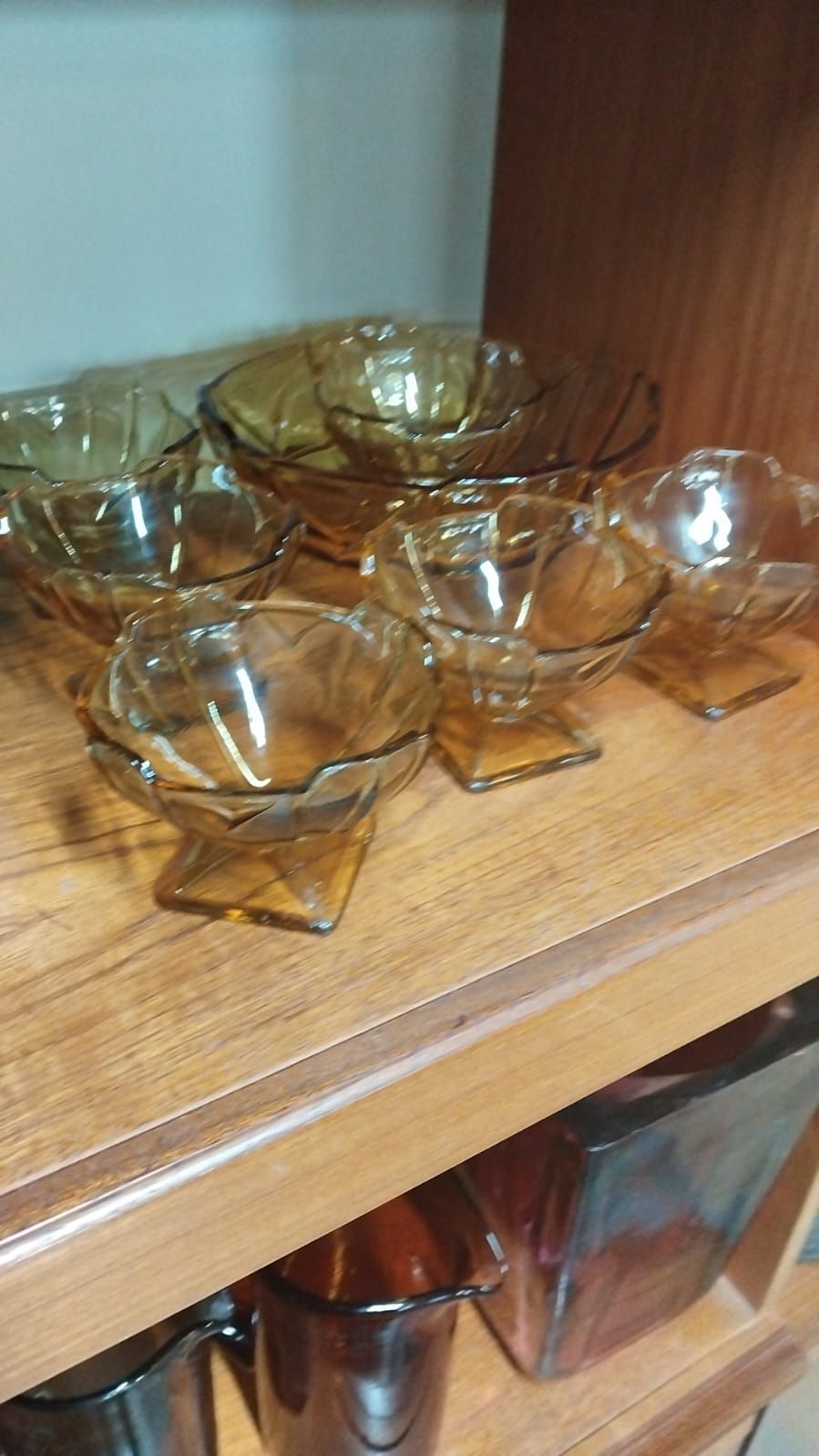 Lot 310 – A Set of Amber Pressed Glass Dessert Bowls Attributed to Sowerby
