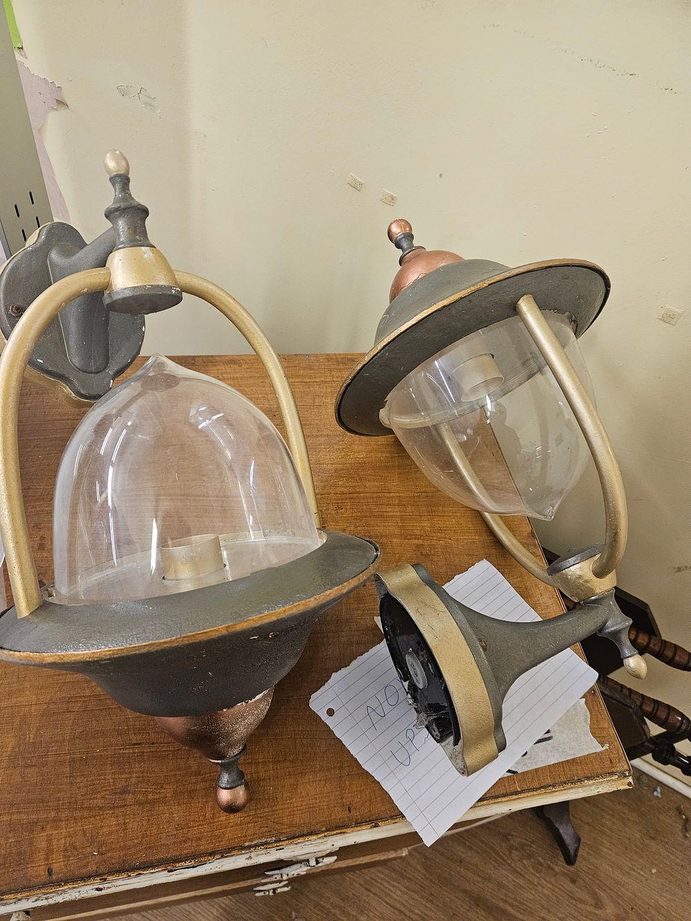 Lot 381 – A Pair of Contemporary Cast Metal and Clear Teardrop Glass Outdoor Wall Sconces