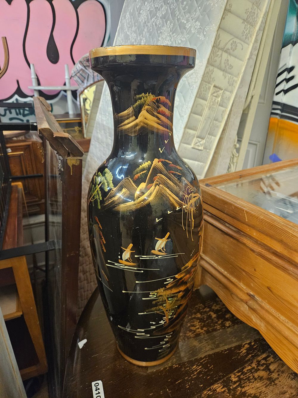 Lot 385 – An Oriental Style Black Glazed Baluster Vase