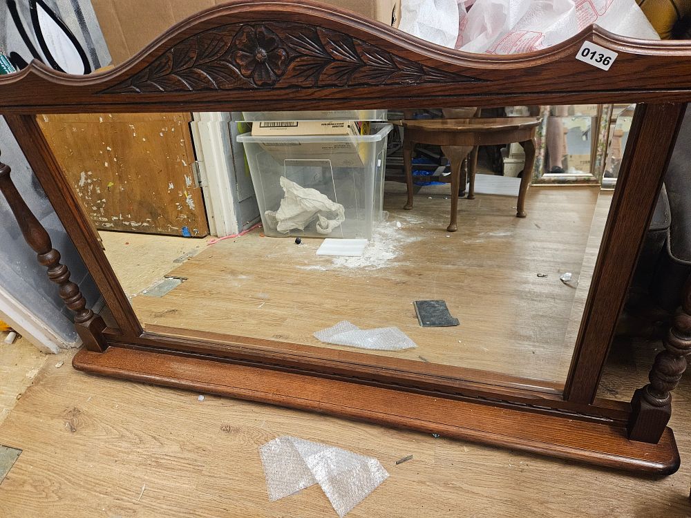 Lot 395 – An Old Charm style carved oak overmantel mirror