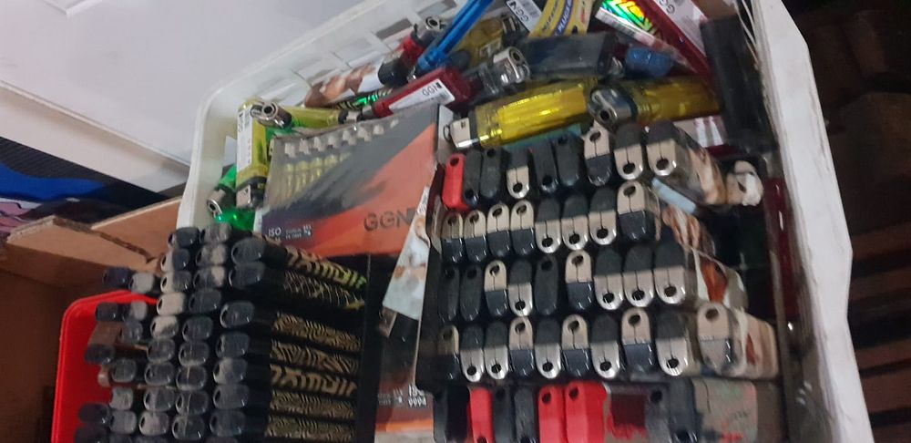 Lot 409 – A Large Assortment of GGN and Unbranded Disposable Cigarette Lighters