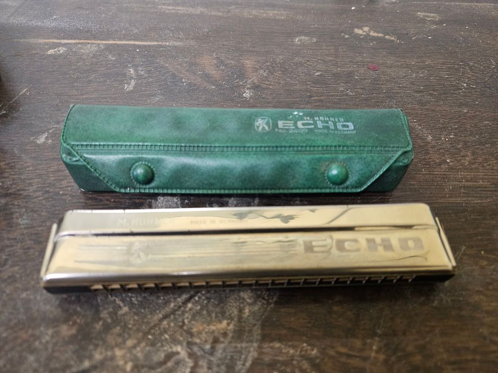 Lot 435 – A Vintage M. Hohner Echo No. 2409 Tremolo Harmonica with Original Case