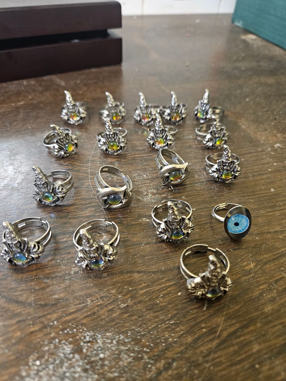 Lot 439 – A Collection of Thirteen Silver-Tone Gothic Style Costume Rings with Iridescent and Eye Cabochons