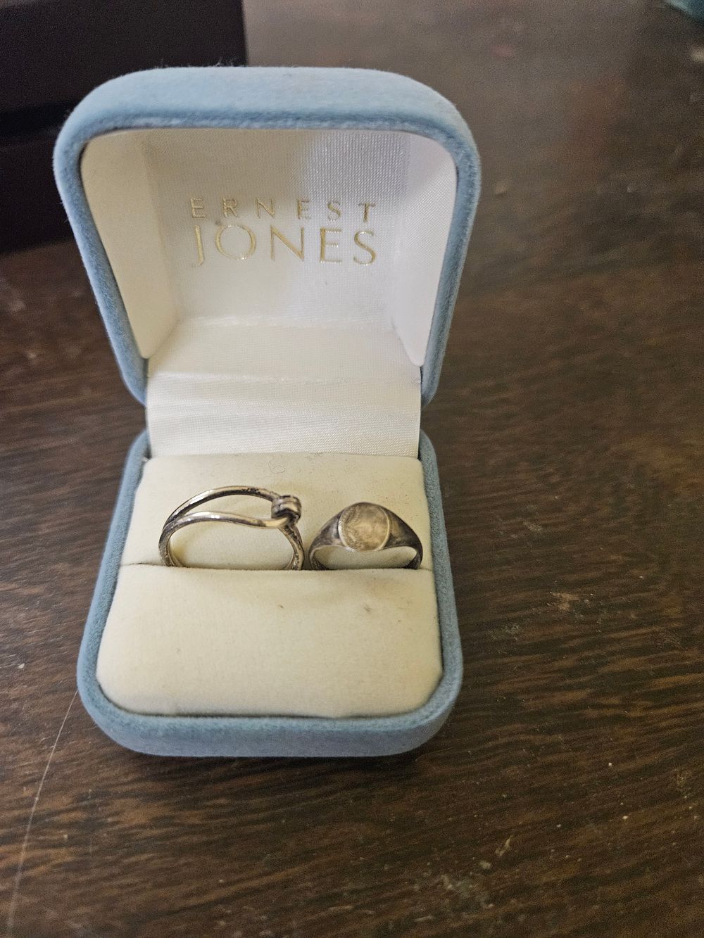 Lot 443 – Two silver Rings in an Ernest Jones Presentation Box