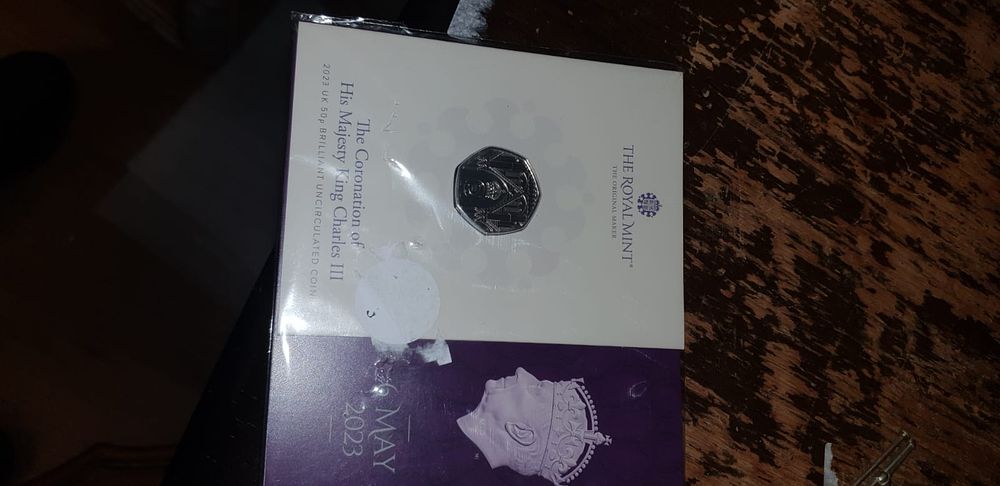Lot 482 – 2023 UK King Charles III Coronation Brilliant Uncirculated 50p Coin