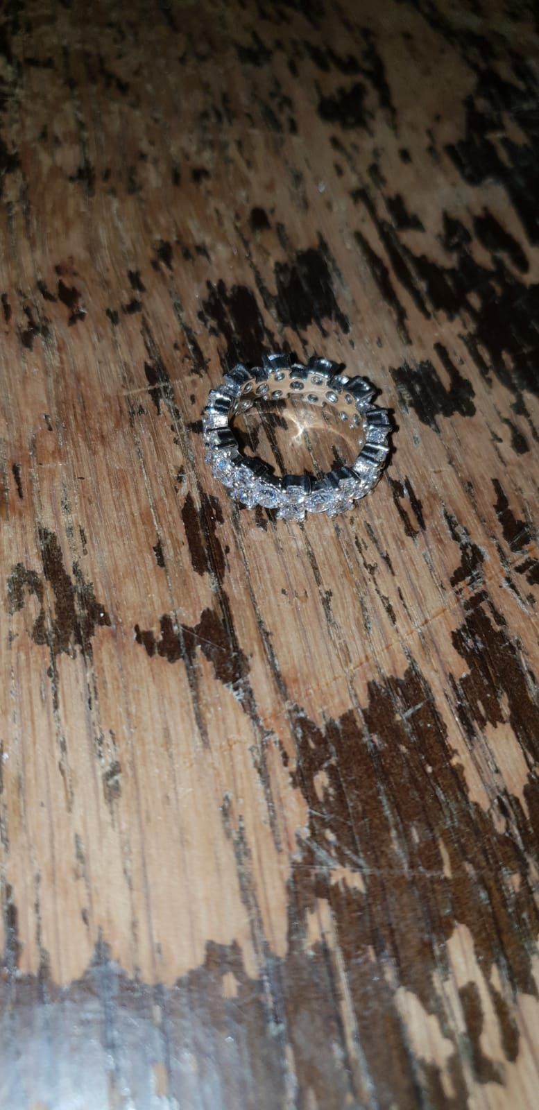 Lot 501 – A 925 double-row full eternity band set with clear stones
