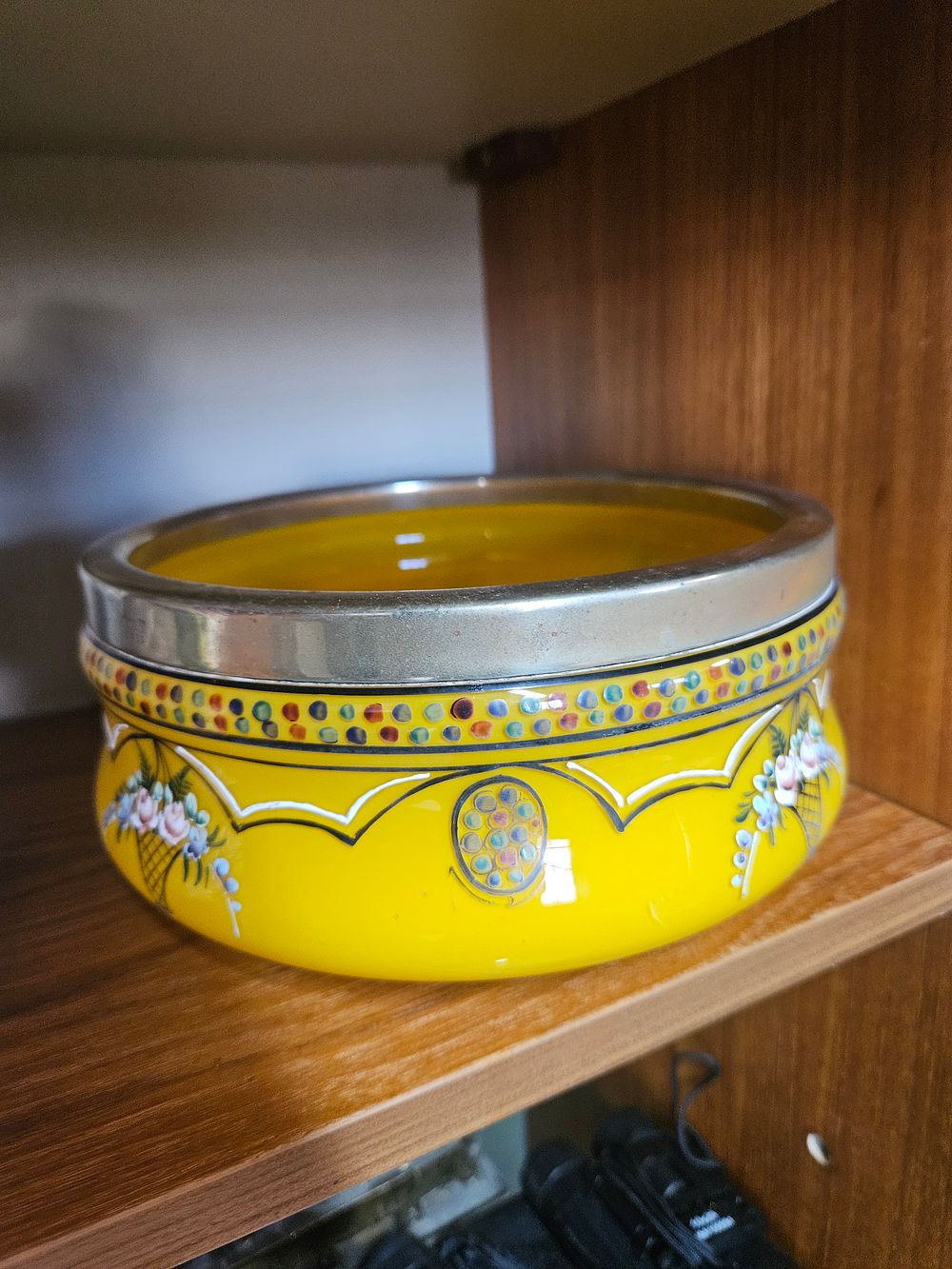 Lot 196 – Mid-20th-century canary-yellow glazed ceramic bowl with hand-painted floral decoration and metal rim