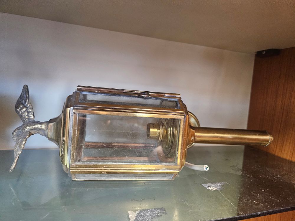 Lot 218 – A Vintage Style Brass Wall Mounted Coach Lantern with Bird Finial
