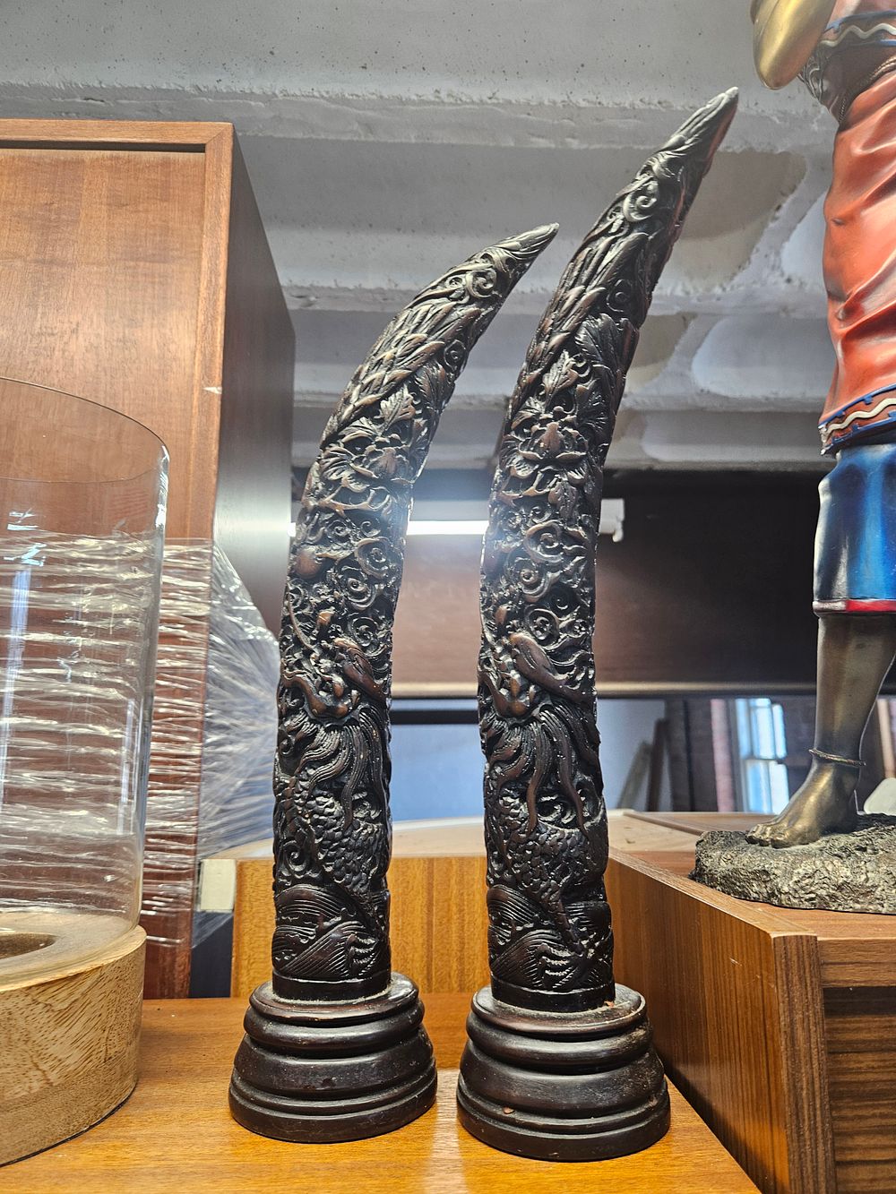 Lot 223 – A Pair of Chinese Carved Resin Tusk-Form Ornaments with Dragon and Phoenix Motifs