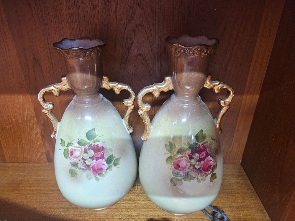 Lot 235 – A Pair of Late 19th or Early 20th Century Blush Ivory Style Gilded Ceramic Vases