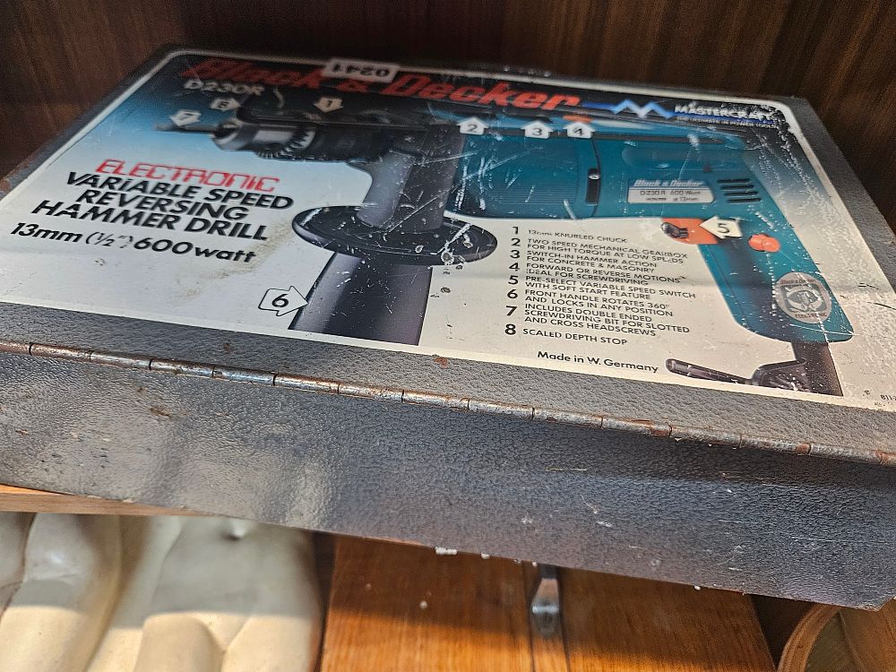 Lot 247 – A Vintage Black and Decker D230R Electronic Hammer Drill in Original Metal Case