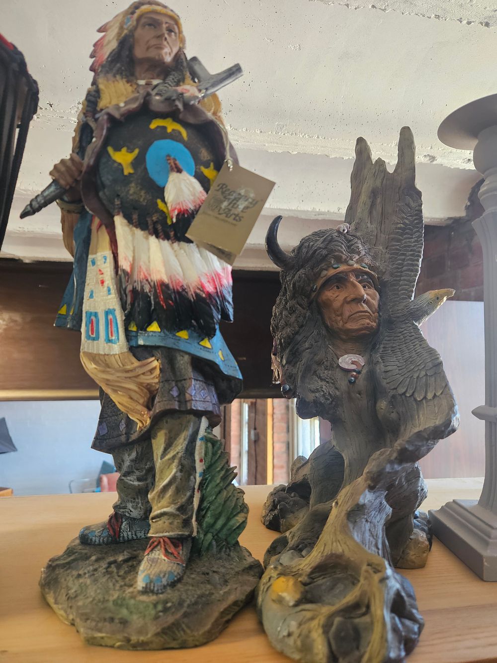Lot 252 – A Pair of Real Life Arts Native American Themed Polystone Figurines