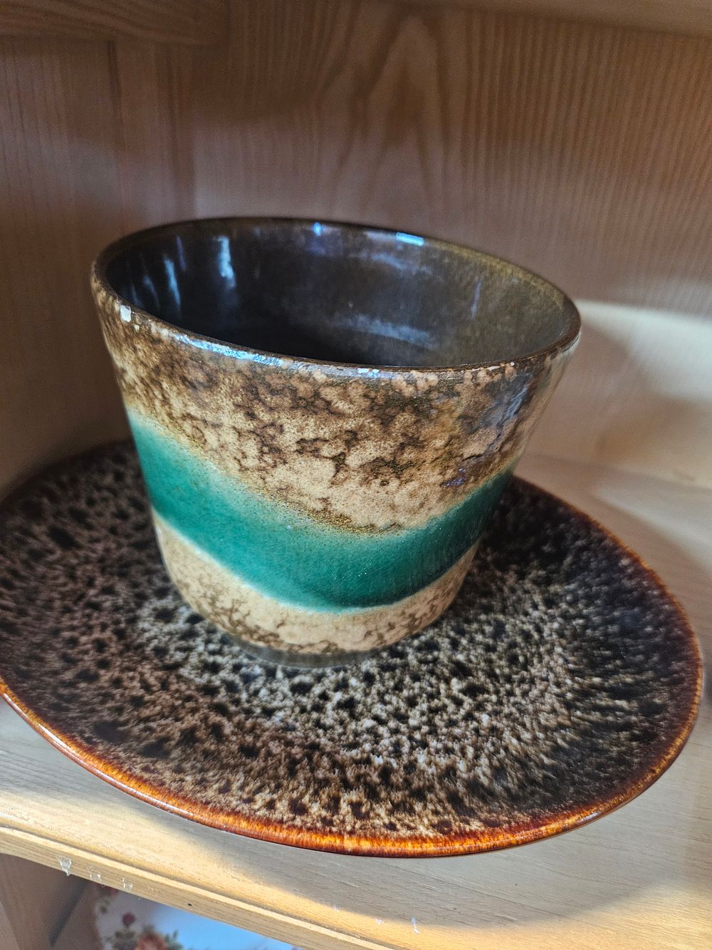 Lot 254 – A Studio Pottery Stoneware Cup and Saucer