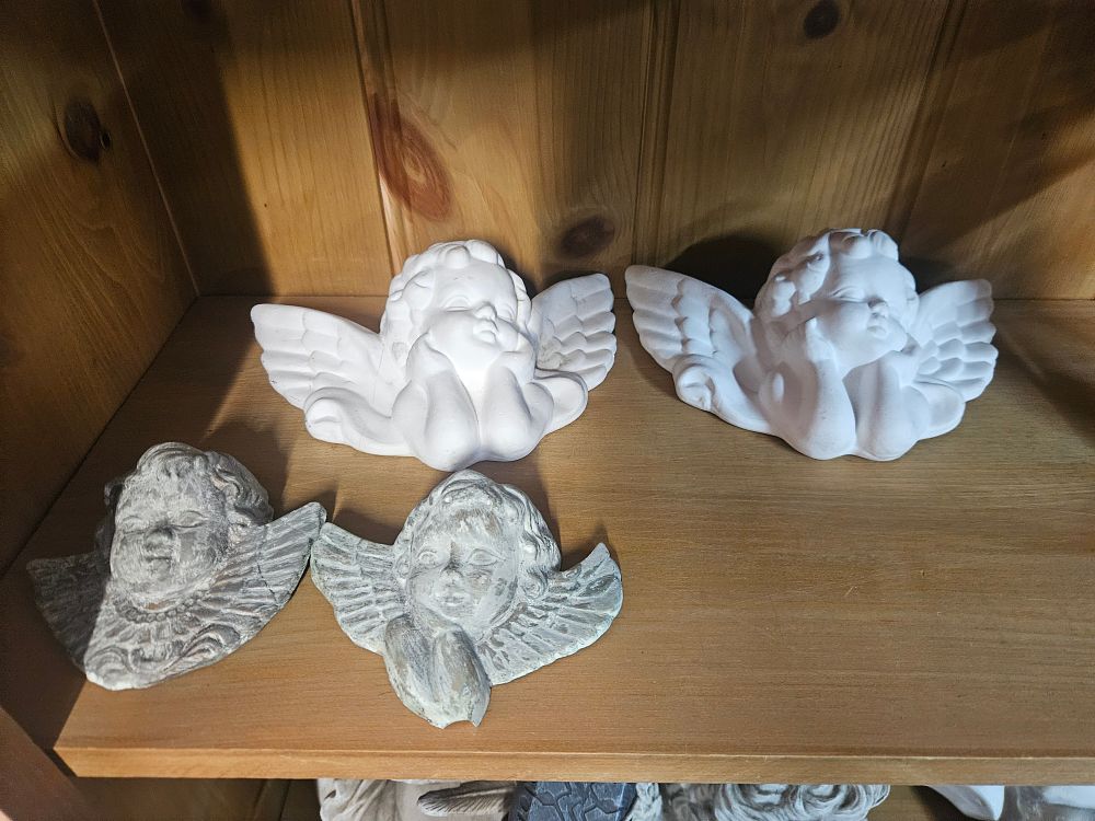 Lot 265 – Four Decorative Cherub and Angel Figurines and Plaques