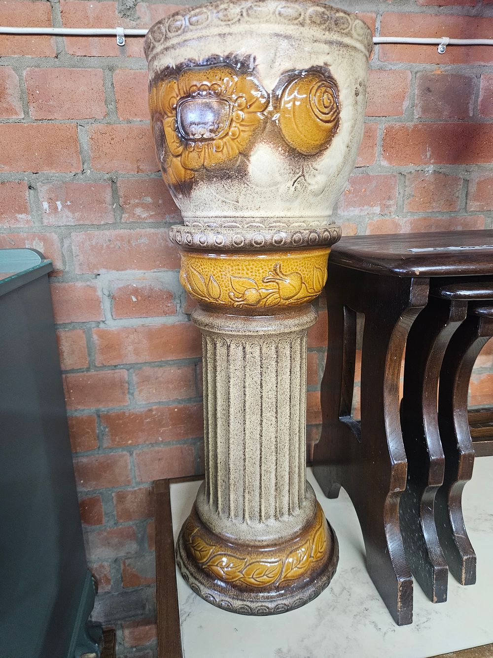 Lot 274 – A West German pottery jardiniere on matching pedestal stand